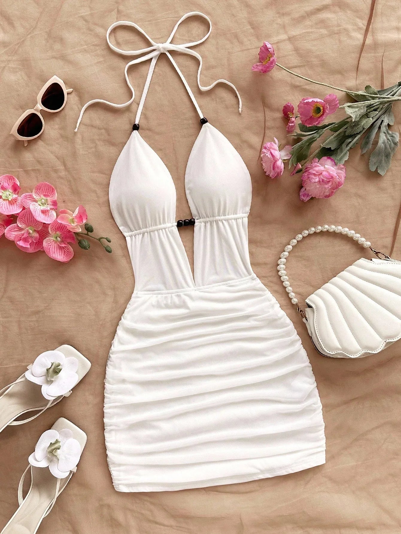 Soleia Women's Vacation Blue & White Floral Print Deep V Neck Tie Strap Backless Ruched Bodycon Mini Dress, Suitable For Party,