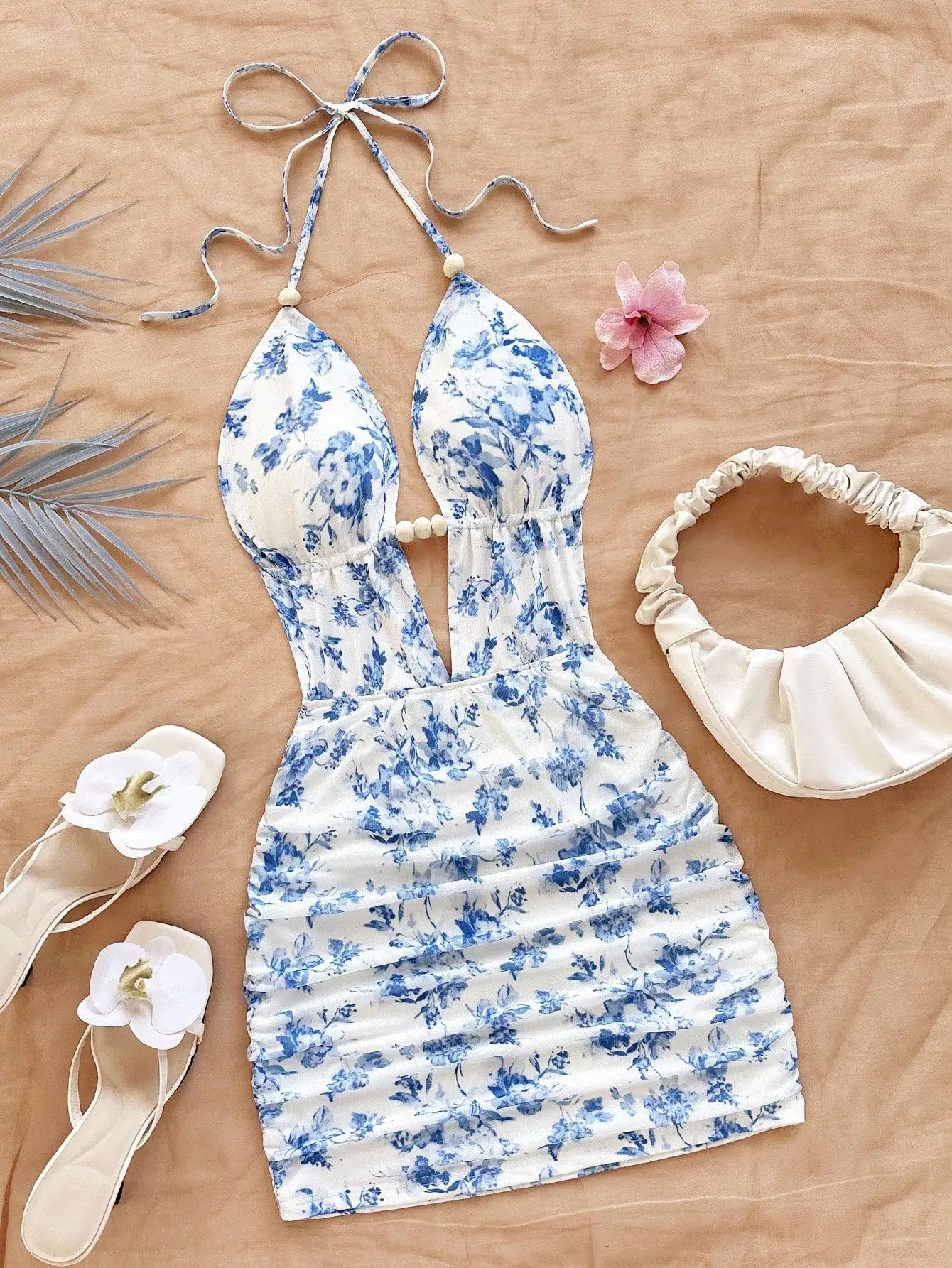 Soleia Women's Vacation Blue & White Floral Print Deep V Neck Tie Strap Backless Ruched Bodycon Mini Dress, Suitable For Party,